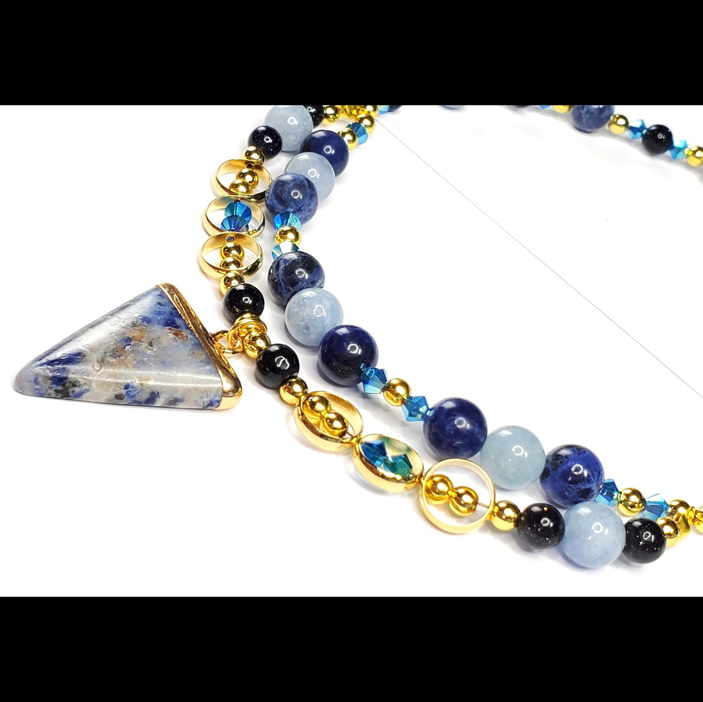 Sodalite and Agate Blue & Gold Gemstone Necklace with Agate, Sodalite, and Goldstone Beads along with a Sodalite and Brass Pendant