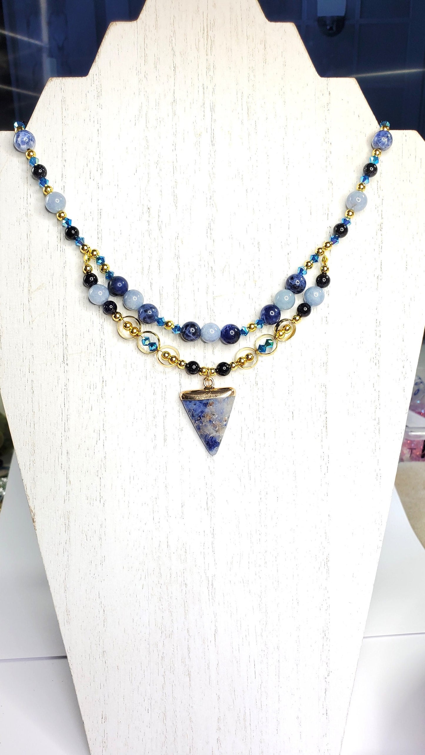 Sodalite and Agate Blue & Gold Gemstone Necklace with Agate, Sodalite, and Goldstone Beads along with a Sodalite and Brass Pendant
