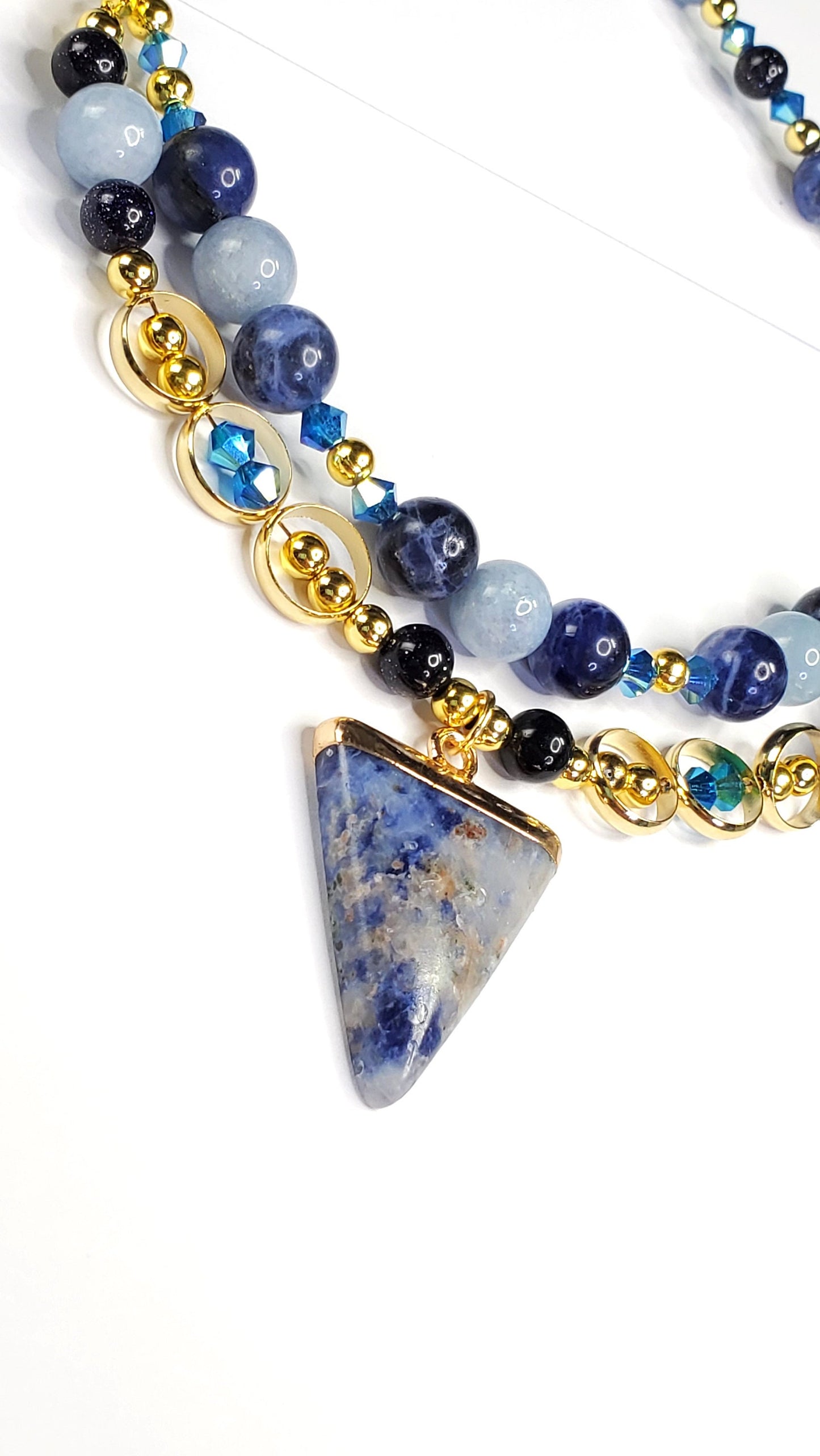 Sodalite and Agate Blue & Gold Gemstone Necklace with Agate, Sodalite, and Goldstone Beads along with a Sodalite and Brass Pendant